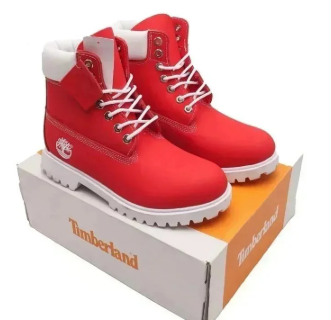 Red workwear boots on shoebox