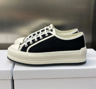 Black and white chunky low-top shoe side view