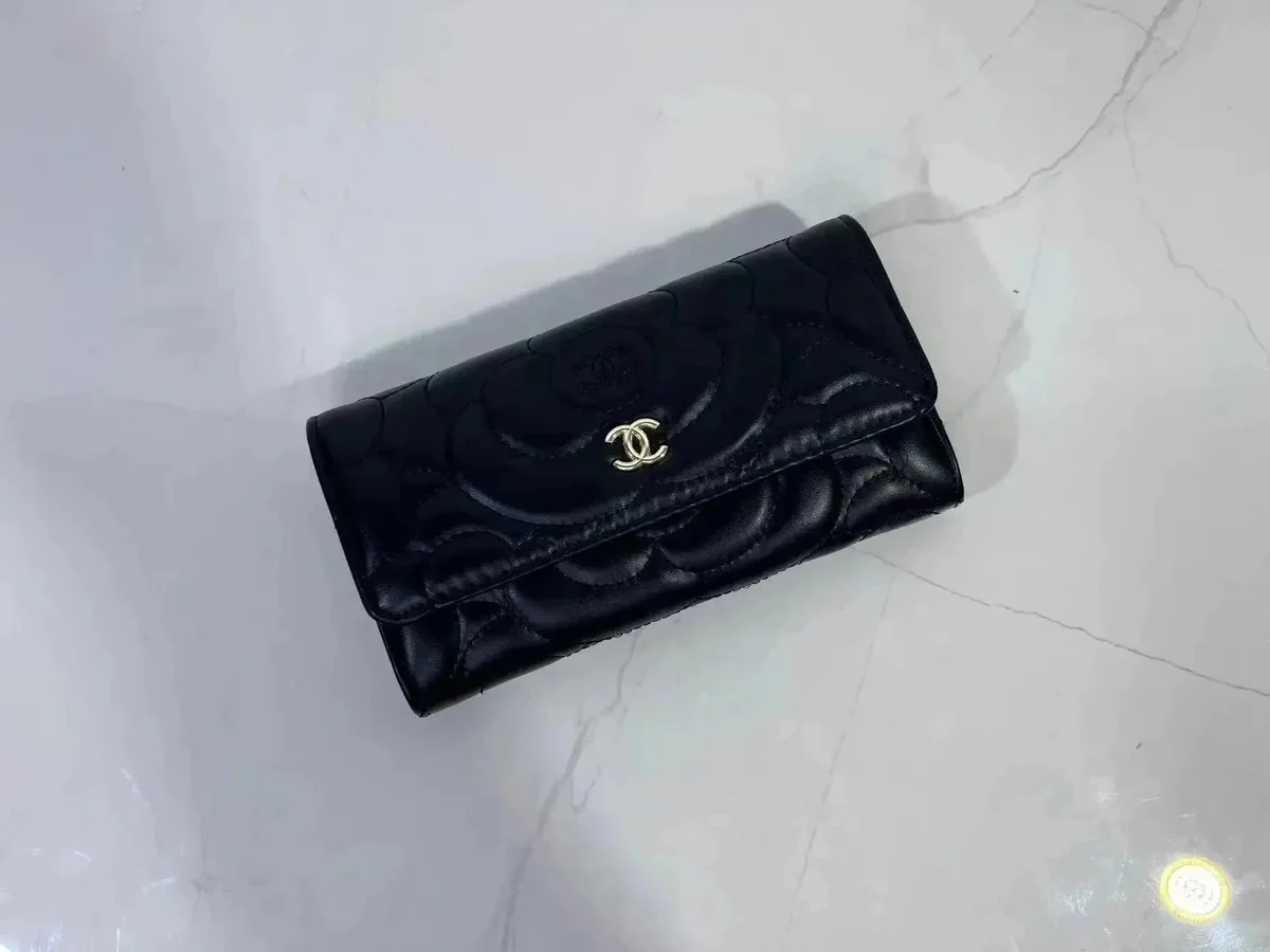 Chanel classic flap black lambskin wallet in UUFinds spreadsheet