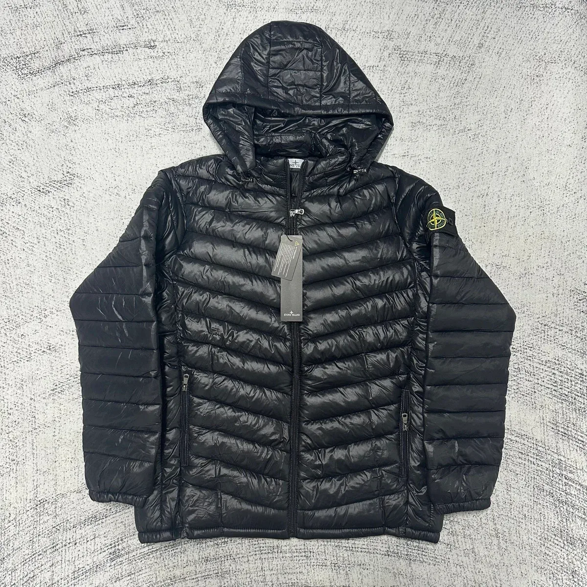 Stone Island black hooded puffer jacket in UUFinds spreadsheet
